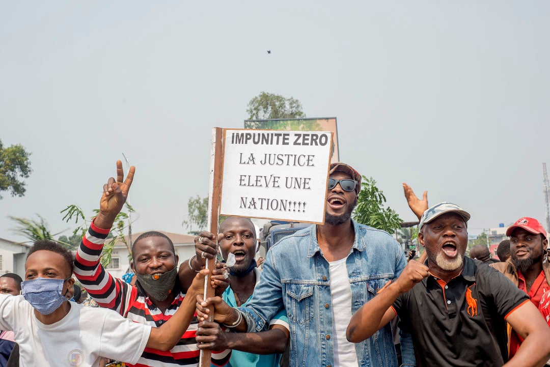 Des manifestants, à Kinshasa, le 24 juin 2020. © Arsene Mpiana / AFP