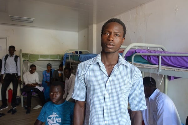 Elimane Diouf, 24 ans avec des camarades dans sa chambre sur le campus de l'Ucad. © Manon Laplace/Jeune Afrique/2018.