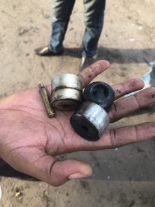 Une douille de balle et des restes de grenades de gaz lacrymogène retrouvées près de l'église. DR