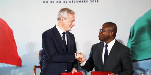 Le ministre français des Finances, Bruno Le Maire, et son homologue béninois, Romuald Wadagni, à Abidjan, le 21 décembre 2019.