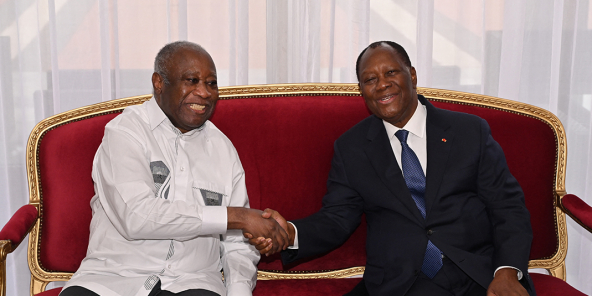 Alassane Ouattara et son prédécesseur, Laurent Gbagbo, au palais présidentiel d’Abidjan, le 27 juillet 2021.